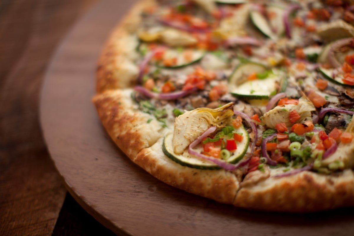 Overloaded Pizza Monterey on a wooden table