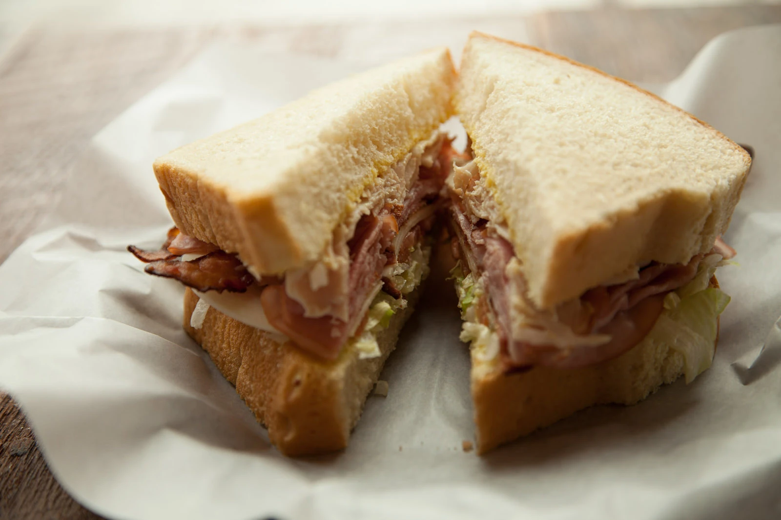 Village Baker club sandwich on fresh-baked bread